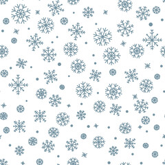 Snowflakes - seamless pattern for the New Year holiday. The texture of winter patterns for the design of fabrics, wallpapers and packaging.