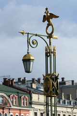 Fototapeta na wymiar Russia. Saint-Petersburg. Lantern with a double-headed eagle on the Panteleimon Bridge.