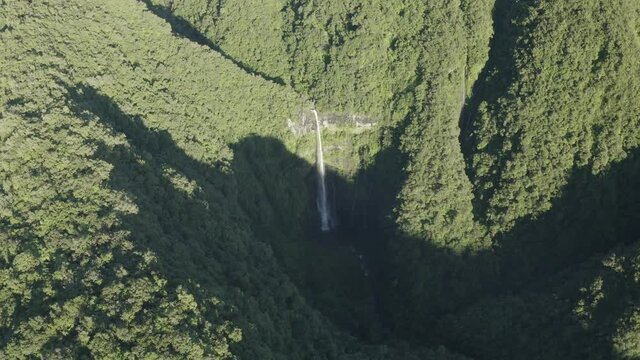 Panoramic aerial view of mountain landscape during a sunny day near Cascade de Takamaka, a waterfall near Saint Benoit, Reunion.