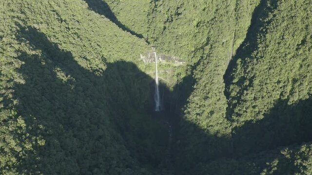 Aerial view of Cascade de La Grande Ravine, a beautiful waterfall among the wild mountains near Saint Benoit, Reunion.