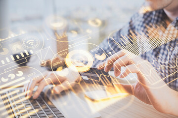 Double exposure of man hands holding a credit card and tech theme drawing. Technology in E-commerce concept.