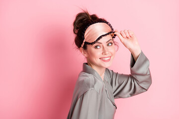 Profile side photo of young girl happy positive smile hand touch sleeping mask isolated over pastel color background