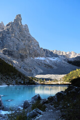 Fototapeta na wymiar Lake Sorapis with the mountain the Finger of God in the background, Dolomites, Italy