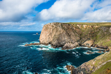 Beautiful view of blue ocean and clif in ireland