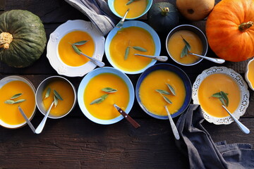 Thanksgiving concept with pumpkin, pumpkin soup .Fall table setting for celebration Autumn holiday...