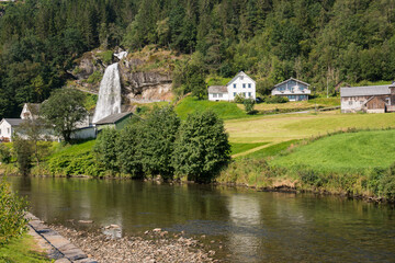 Fototapeta na wymiar Steinsdalsfossen waterfall and landscape in Norway 