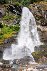 Steinsdalsfossen waterfall and landscape in Norway 