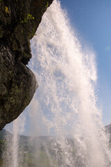 Steinsdalsfossen waterfall and landscape in Norway 