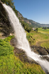 Steinsdalsfossen waterfall and landscape in Norway 