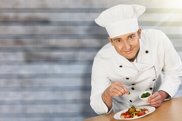 Man learning to make a salad and healthy food, stay at home concept