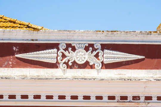 pediment and walls of a renovated house in the old town of Silves, Algarve, Portugal