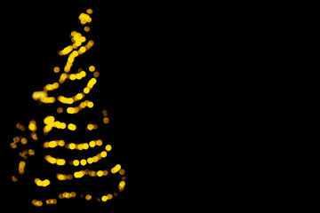 Christmas bokeh overlay background. Golden christmas tree lights on the black background. New Year, festive atmosphere