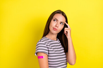 Photo of think young brunette lady look wear t-shirt isolated on yellow background