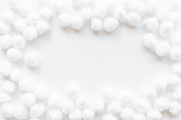 Fototapeta premium Cotton wool balls pattern for cleansing skin. Cosmetic makeup remover supplies