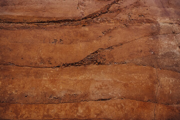 Earthly Textures: Layered Soil Patterns and Cracked Barren Ground as Abstract Natural Background