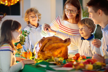 Thanksgiving family dinner. Roasted turkey meal.