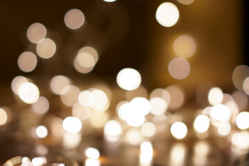 Obraz premium Beautiful bokeh pattern background created by orange light.:blur