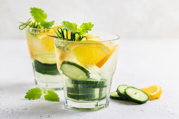 Summer refreshing cucumber orange iced drink. Space for text.