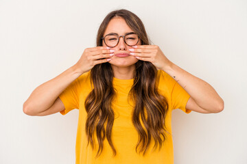 Young caucasian woman isolated on white background doubting between two options.