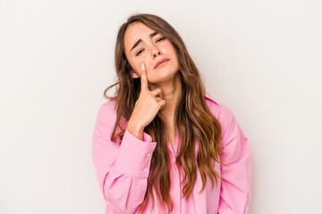 Young caucasian woman isolated on white background crying, unhappy with something, agony and confusion concept.