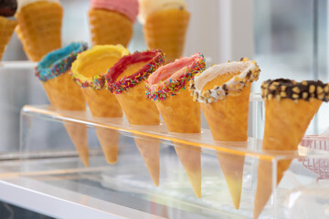 Ice cream cone on display of ice cream shop.