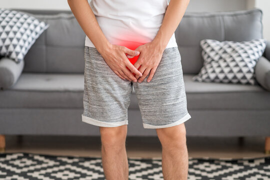 Male fertility concept, pain in prostate, man suffering from prostatitis or from a venereal disease, urological genital infections