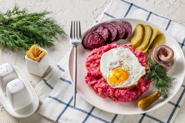 labskaus, mashed potatoes with the beet, fried egg