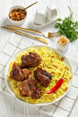roasted meat served with raisins saffron rice