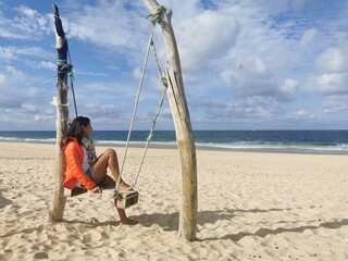 Person resting in the open air. Relaxing on the beach in autumn. solitude 