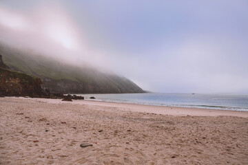 Empty Keem beach in the morning fog. Achill island, county Mayo, Ireland. Popular travel and...