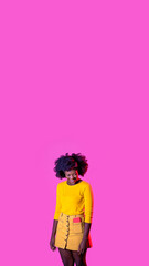 Studio portrait young black woman smiling positive laughing shy isolated background