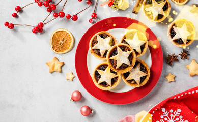 Traditional British Christmas pastry Mince Pies with apple, raisins, nuts filling. Top view