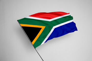 South Africa flag isolated on white background. close up waving flag of South Africa. flag symbols...