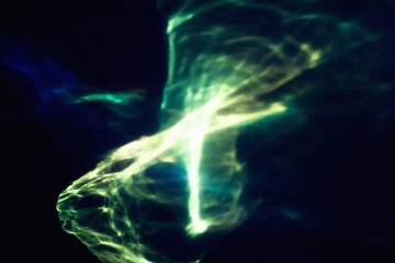 Blue and green northern light on black background. Magic abstract night sky wallpaper. Neon grainy gradient overlay