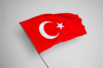 Turkey flag isolated on white background. close up waving flag of Turkey. flag symbols of Turkey. Concept of Turkey.