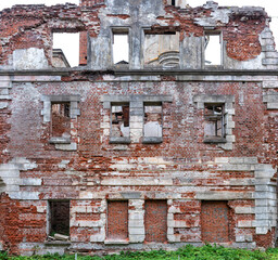 Old brick facade building destruction