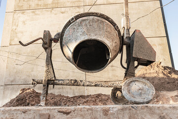 Industrial concrete mixer at a construction site. Preparation of concrete and mortar.