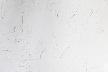 old background of white cement surface with cracks