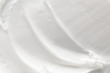 delicate white face cream background