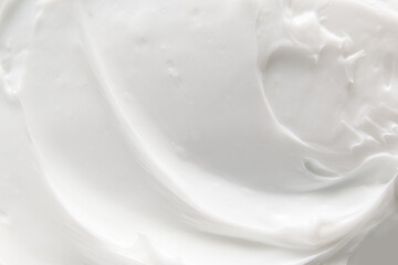 delicate white face cream background