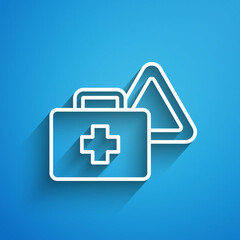 White line First aid kit and warning triangle icon isolated on blue background. Must be in the car. Long shadow. Vector