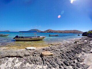 Motor boat on the shore of an island in Fiji