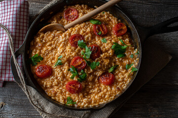 Risotto with Tomatoes, parmesan cheese and roasted Tomato topping