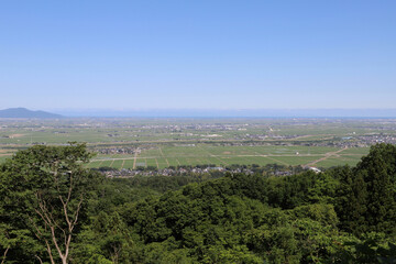 Fototapeta na wymiar 護摩堂山・山頂から見る越後平野（新潟県田上町）