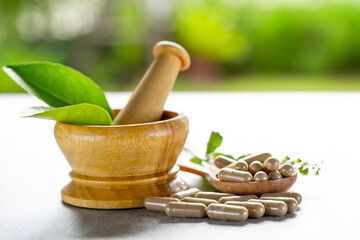 Alternative medicine herbal organic capsule with vitamin E omega 3 fish oil, mineral, drug with herbs leaf natural supplements for healthy good life.