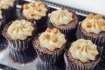 Salted caramel cupcakes, tempting little chocolate cupcakes with a baileys flavour frosting and caramel drizzle