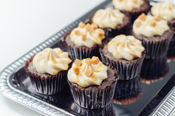 Salted caramel cupcakes, tempting little chocolate cupcakes with a baileys flavour frosting and caramel drizzle