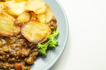 Minced beef hotpot, tender british beef in a warming gravy with carrots and peas, all topped with sliced roast potatoes
