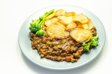Minced beef hotpot, tender british beef in a warming gravy with carrots and peas, all topped with sliced roast potatoes