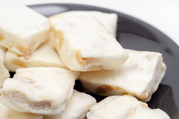 Traditional confections made with sugar or honey, roasted nuts and whipped egg whites